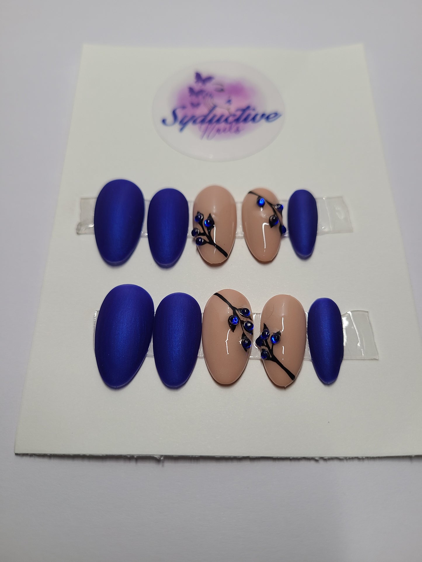 Matte royal blue and nude nails with blue gems. Medium Almond, (14 pieces) Press-On Nails including Prep Kit (PN000056)