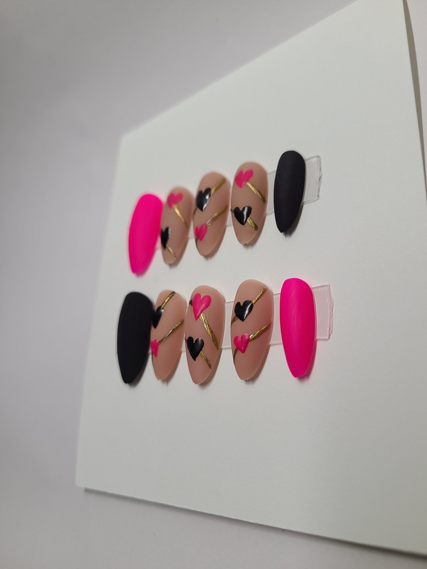 Matte black and pink with hearts and gold lines. Medium Almond, (24 pieces) Press-On Nails including Prep Kit (PN000094)