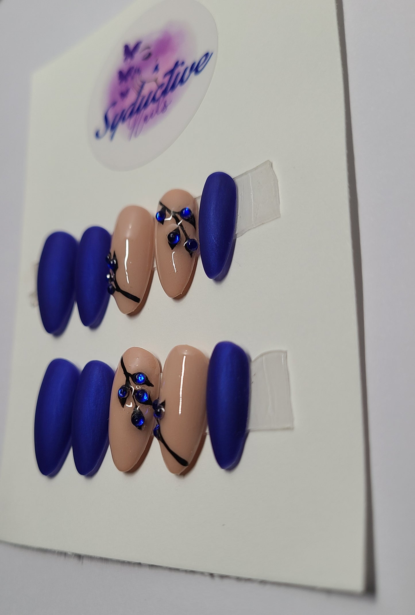 Matte royal blue and nude nails with blue gems. Medium Almond, (14 pieces) Press-On Nails including Prep Kit (PN000056)