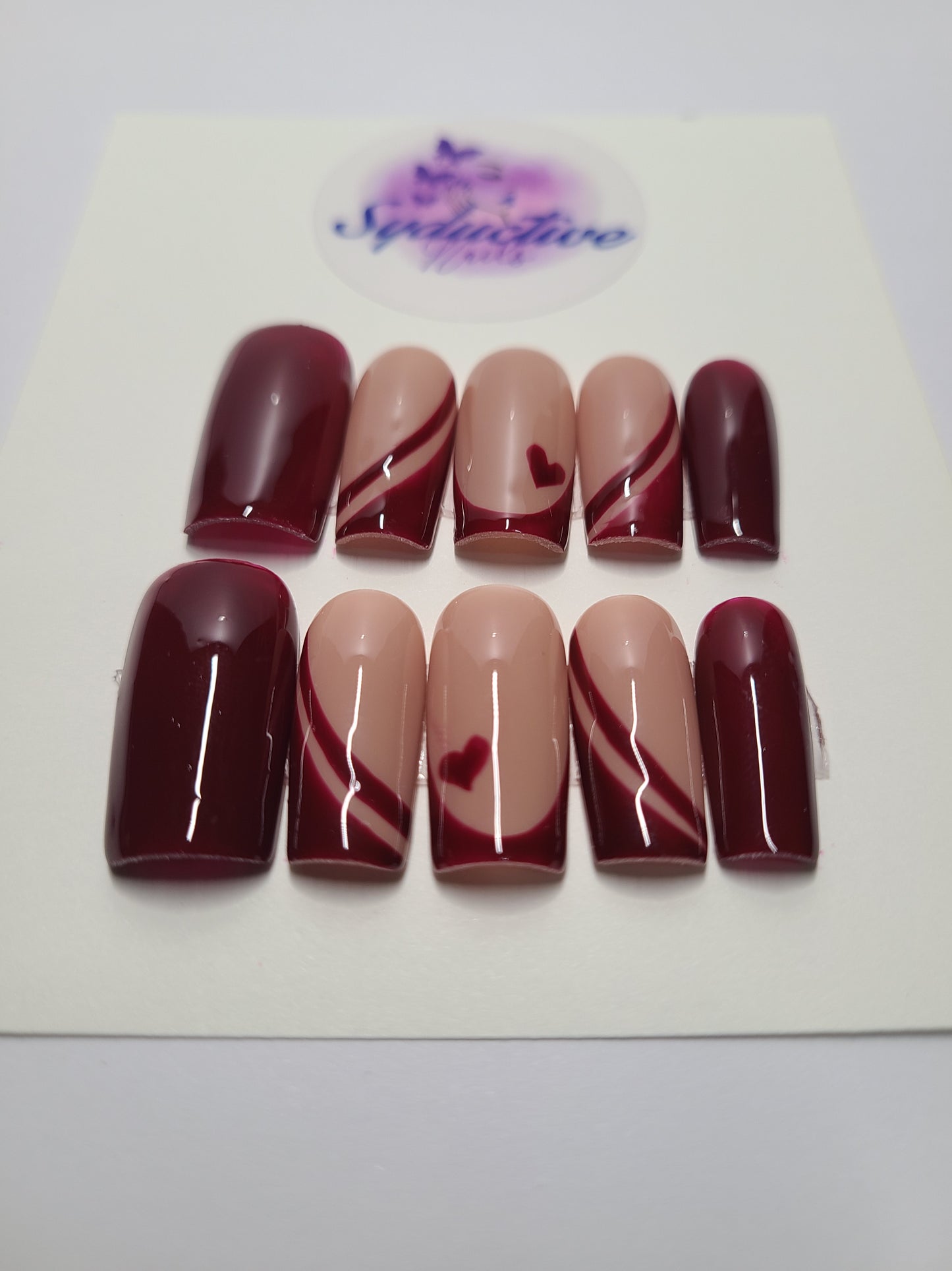Burgundy multi-design nails with hearts and lines. Medium Square,(16 pieces) Press-On Nails including Prep Kit (PN000075)