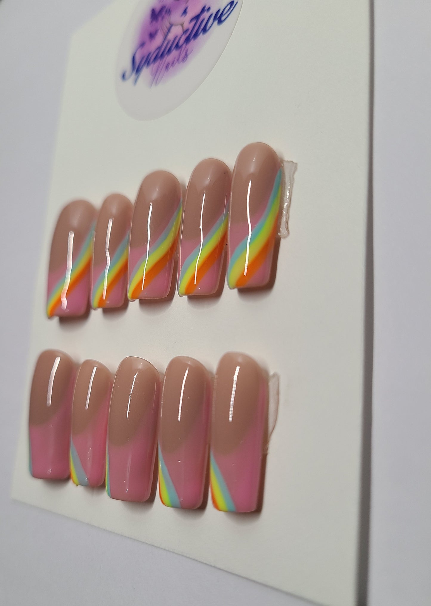 Pink french nail design with colorful lines (blue, orange, and yellow). Medium Square, (16 pieces) Press-On Nails including Prep Kit (PN000074)