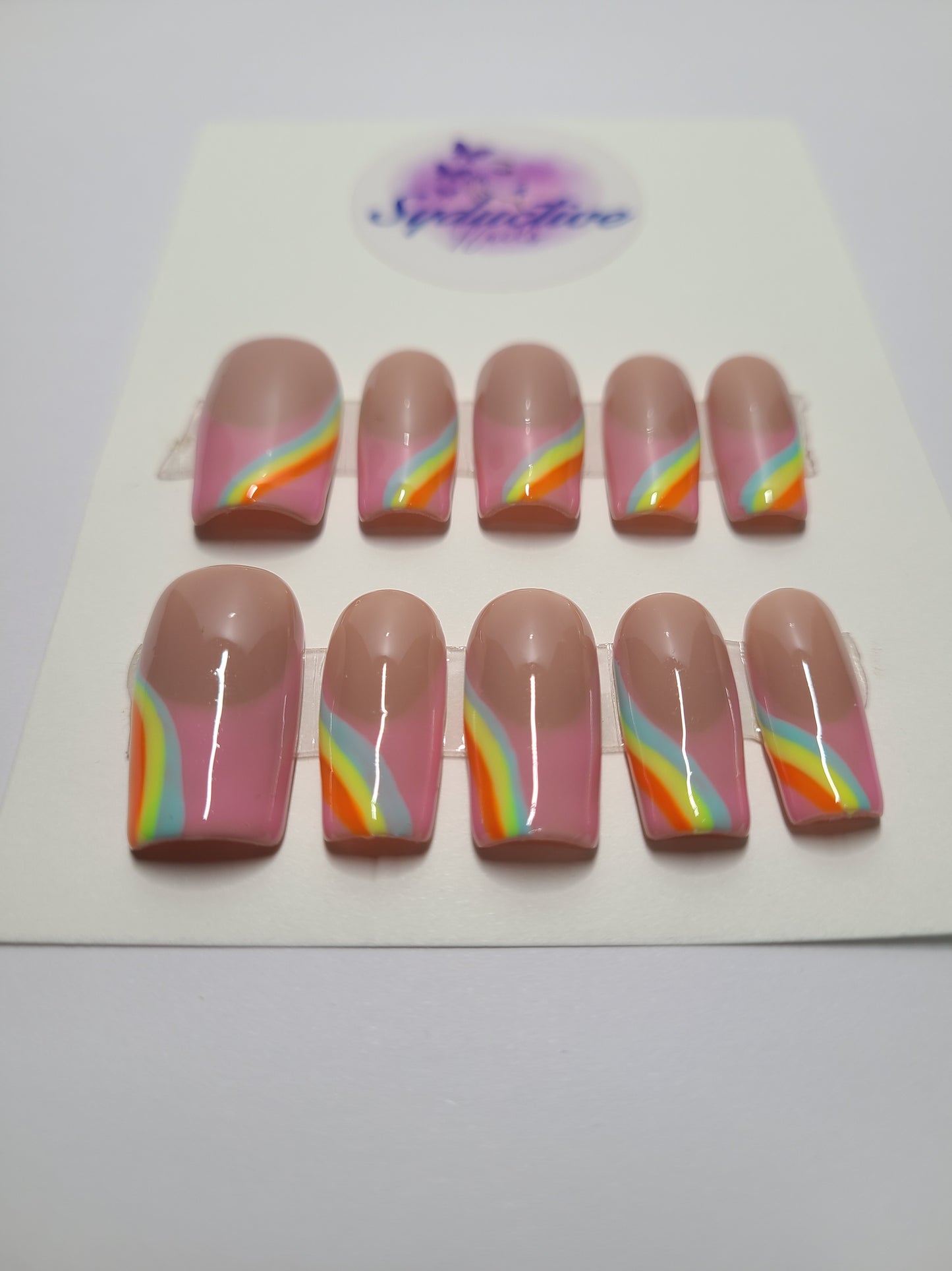 Pink french nail design with colorful lines (blue, orange, and yellow). Medium Square, (16 pieces) Press-On Nails including Prep Kit (PN000074)