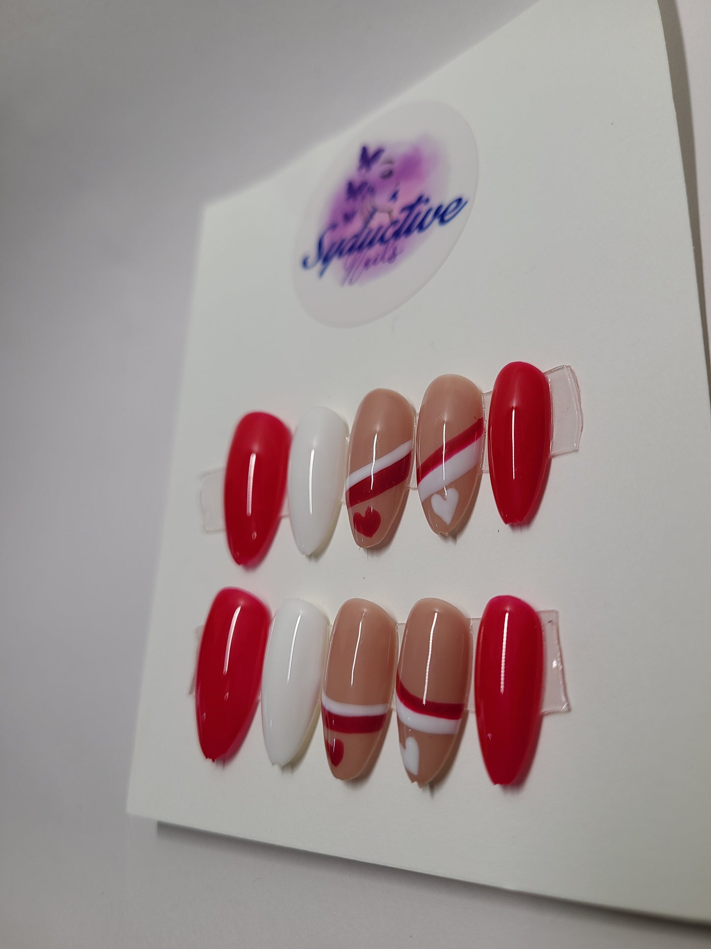 Red and white with lines and hearts. Medium Almond, (24 pieces) Press-On Nails including Prep Kit (PN000095)