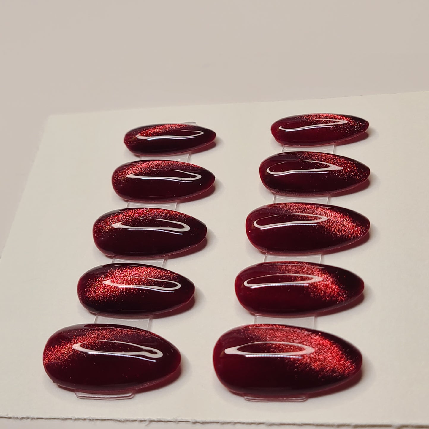 Crimson Eclipse Medium Almond Press-On Nails