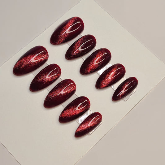 Crimson Eclipse Medium Almond Press-On Nails
