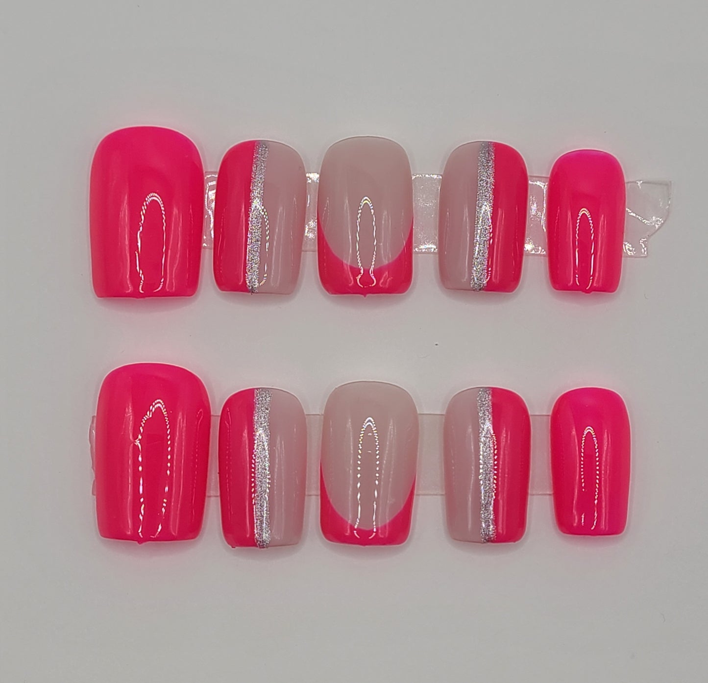 Bright pink multi-design with silver lines. Short Square, (10 pieces) Press-On Nails including Prep Kit