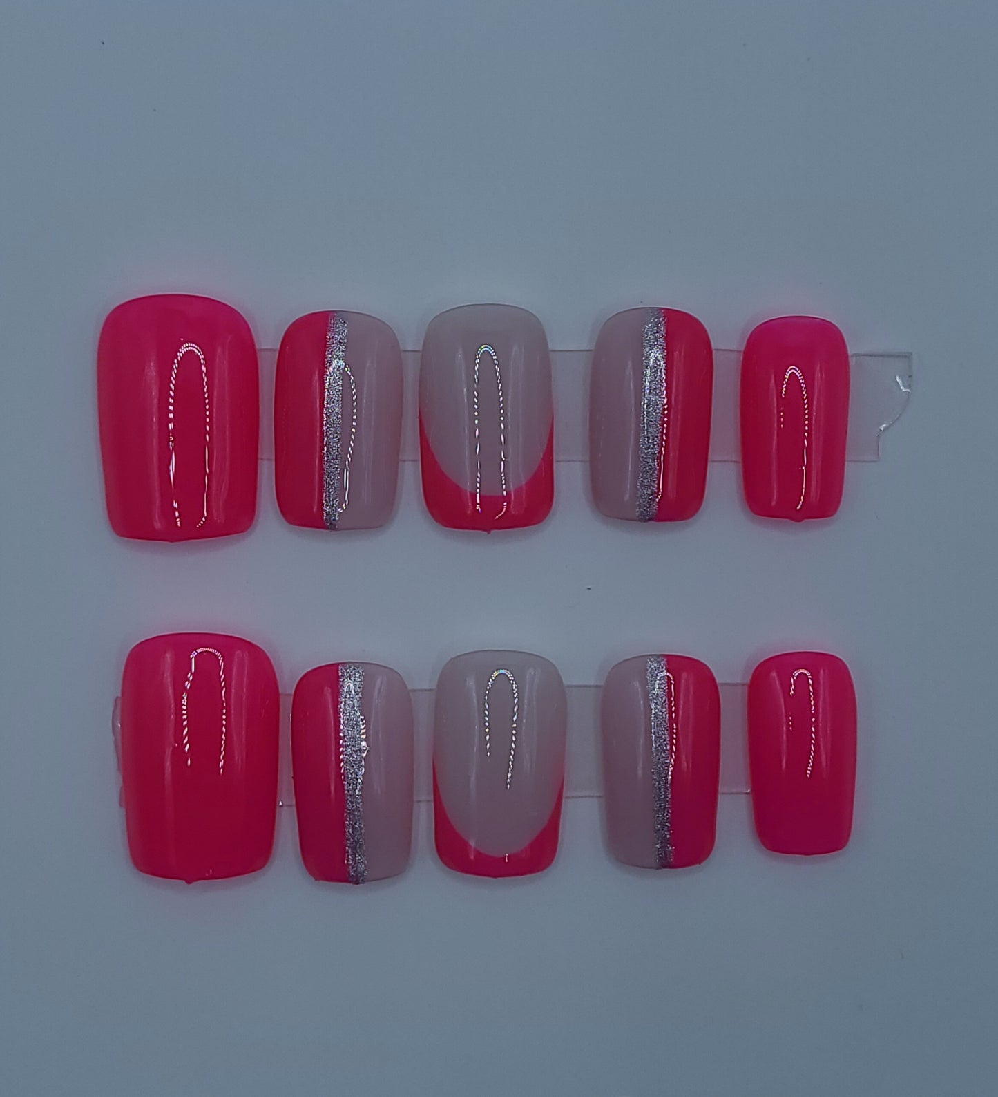 Bright pink multi-design with silver lines. Short Square, (10 pieces) Press-On Nails including Prep Kit