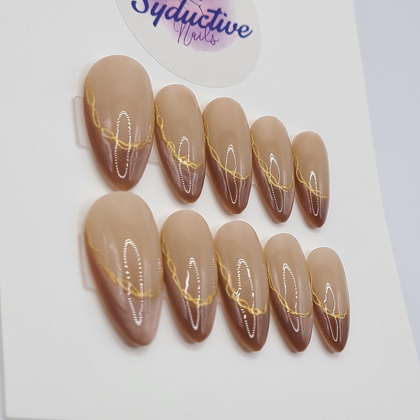 Gilded Tiger Medium Almond Press-On Nails