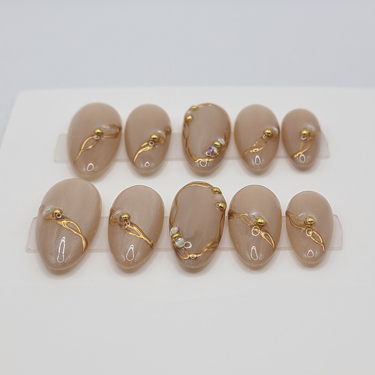 Liquid Treasure Medium Almond Pres-On Nails
