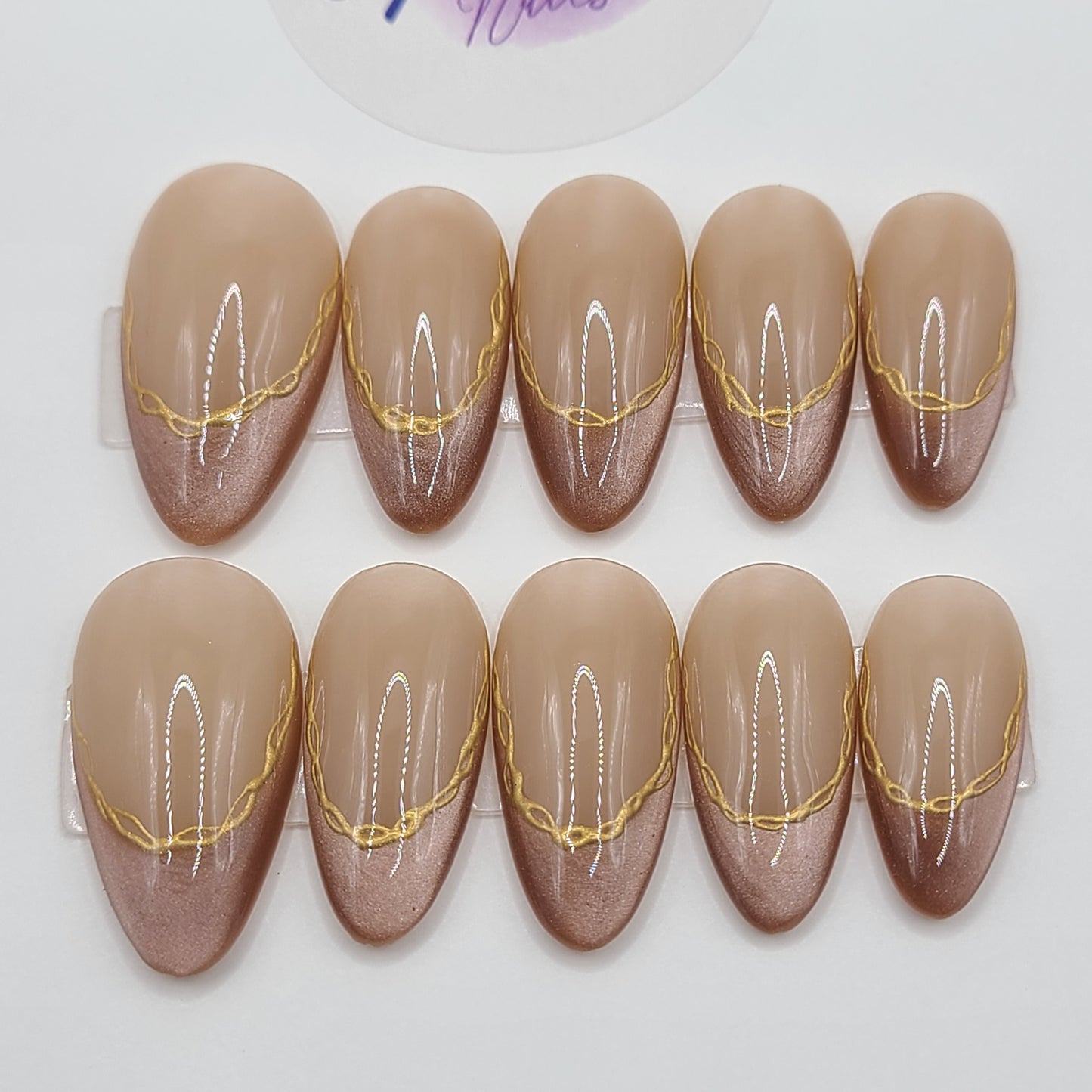 Gilded Tiger Medium Almond Press-On Nails