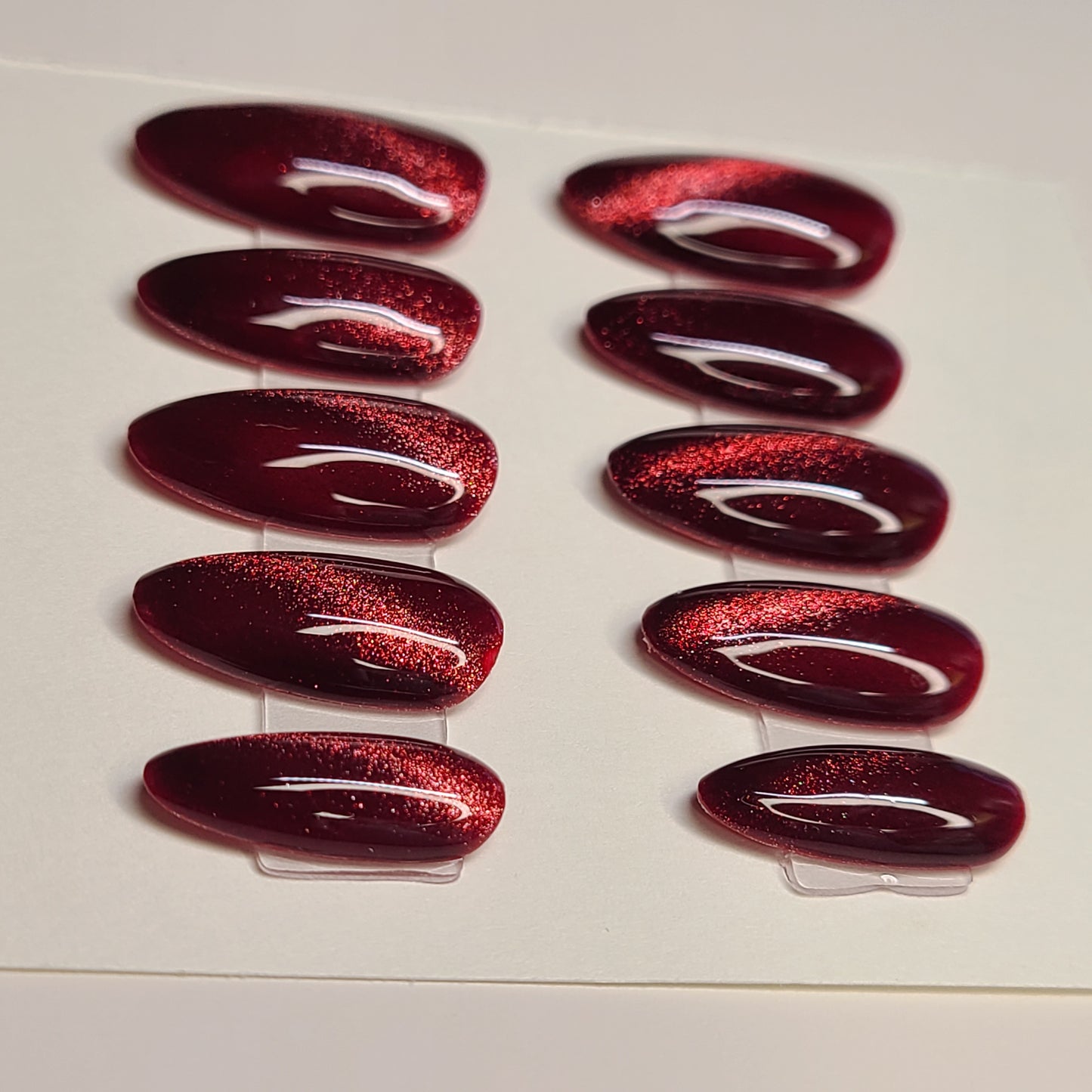Crimson Eclipse Medium Almond Press-On Nails