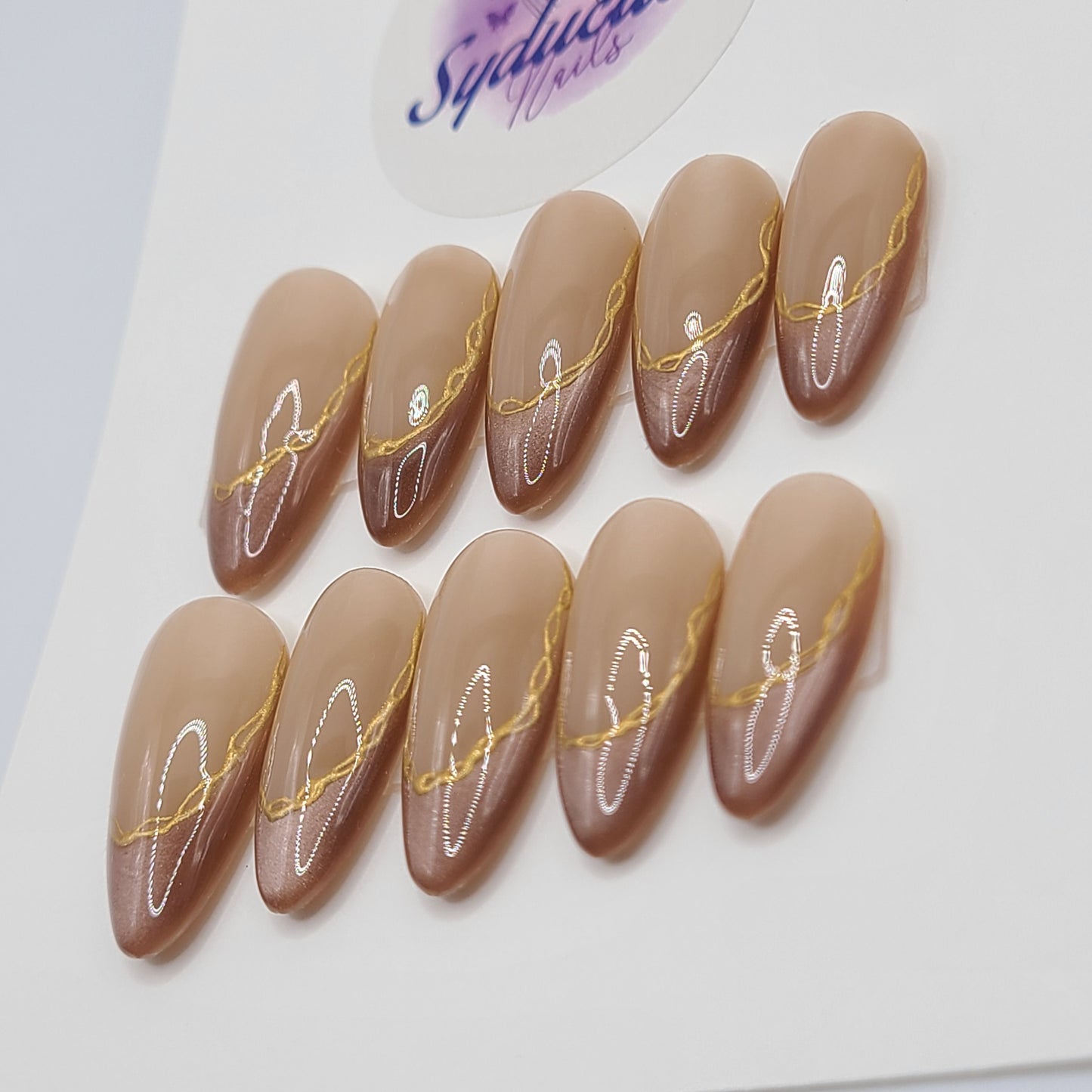 Gilded Tiger Medium Almond Press-On Nails
