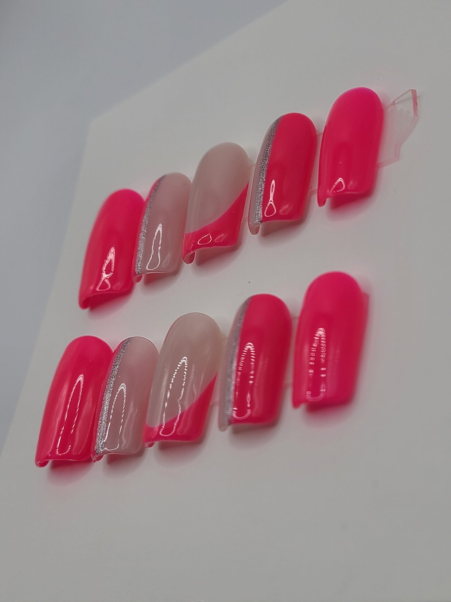 Bright pink multi-design with silver lines. Short Square, (10 pieces) Press-On Nails including Prep Kit